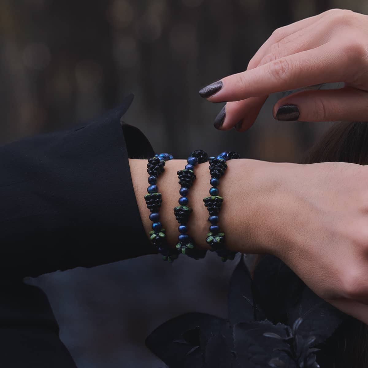 Blue x Midnight Blue Pearl stretch bracelet with freshwater pearls and black berry beads on wrist by NOGU
